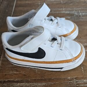 Nike Kids White and Black Sneakers with Orange Trim